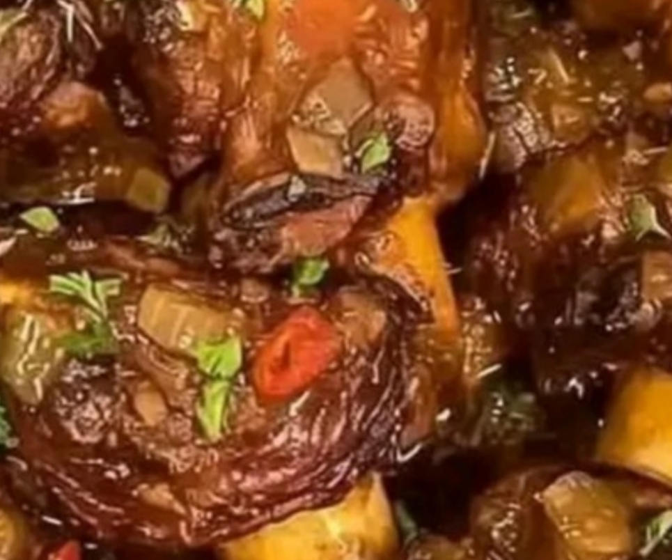 Savory Braised Oxtails with Herb-Infused Sauce